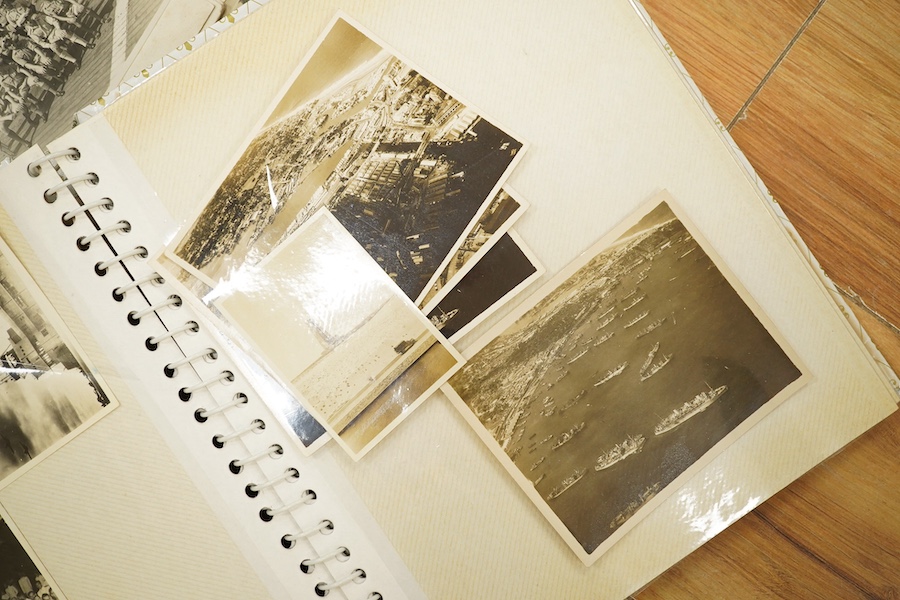 Two photograph albums containing an archive of WWII photos mainly of the RAF in Japan and the Far East, including a number of photos of RAF aircraft, aircraft carriers, Royal Naval ships, photographs of crew, military so